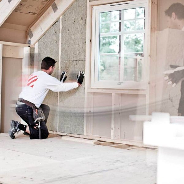Man-insulating-with-stonewool
